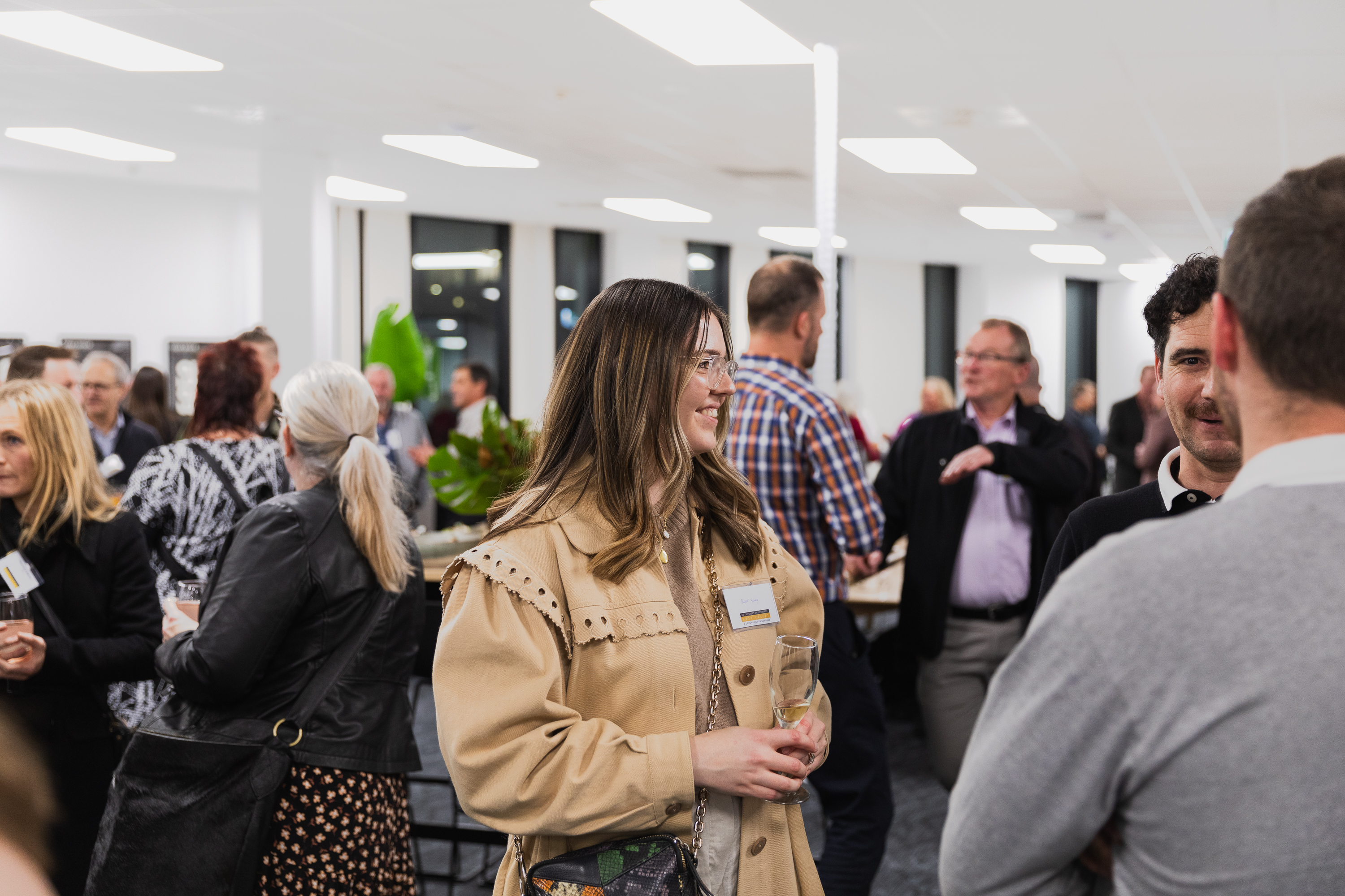 Members connecting at a Q Space community event