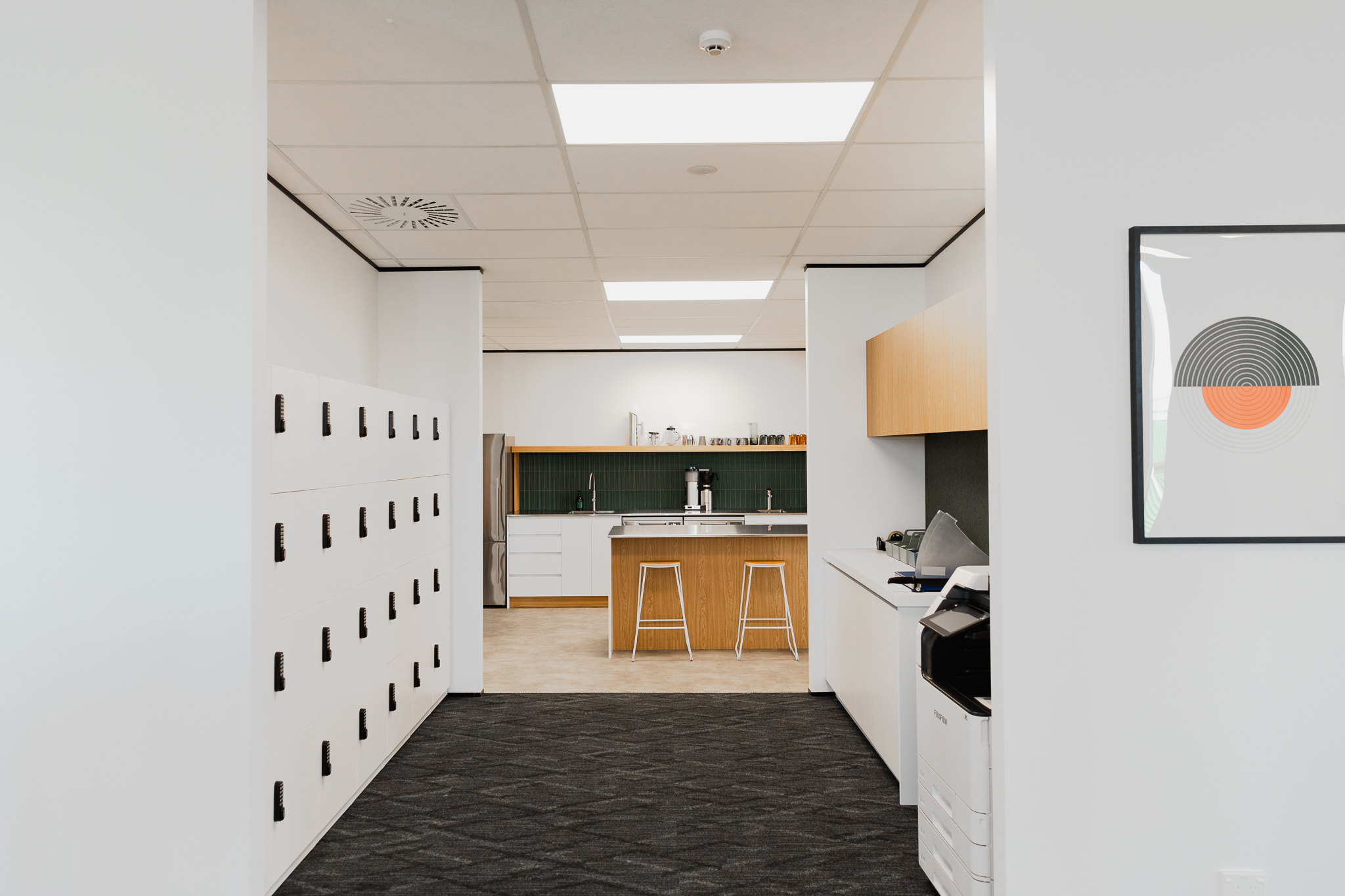 Q Space lockers and kitchen walkway